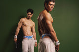 Two models in PUMP! Match Point underwear with cream tennis trousers